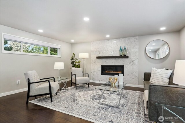 628 163rd Ave SE, Bellevue, WA 98008 - living room with recessed lighting, wood finished floors, a premium fireplace, and baseboards
