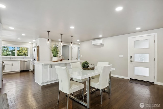 628 163rd Ave SE, Bellevue, WA 98008 - dining area with a wall mounted air conditioner, dark wood finished floors, baseboards, and recessed lighting