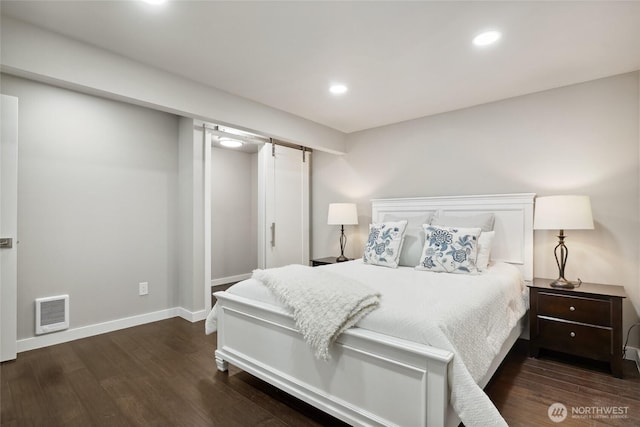 628 163rd Ave SE, Bellevue, WA 98008 - bedroom featuring dark wood finished floors, recessed lighting, and baseboards