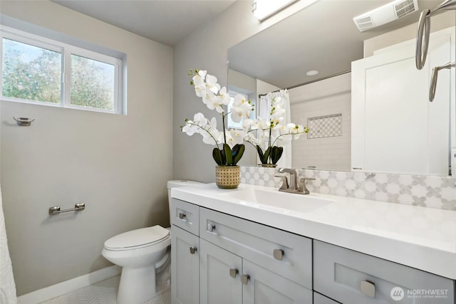 628 163rd Ave SE, Bellevue, WA 98008 - bathroom featuring vanity, toilet, curtained shower, tile patterned floors, and baseboards