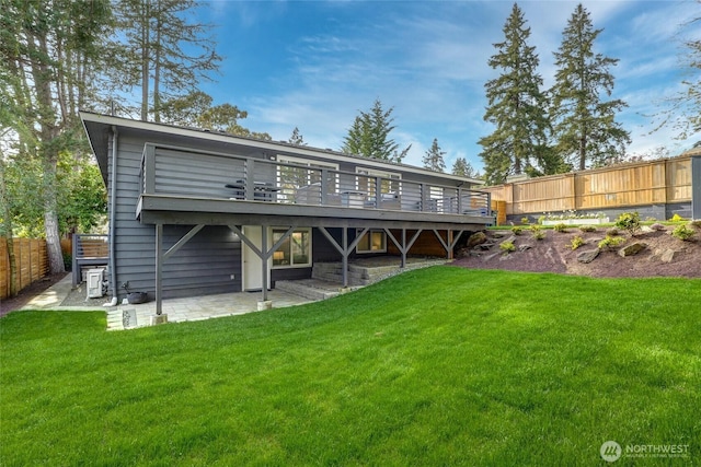 628 163rd Ave SE, Bellevue, WA 98008 - back of house featuring a wooden deck and a patio