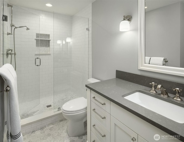 7834 SE 75th Pl, Mercer Island, WA 98040 - full bathroom with toilet, vanity, a shower stall, recessed lighting, and tile patterned floors