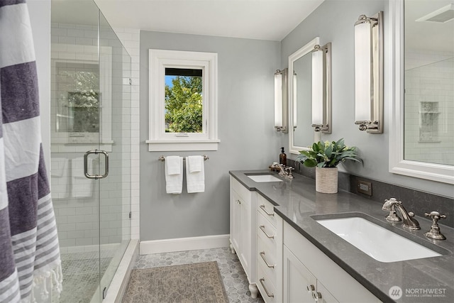 7834 SE 75th Pl, Mercer Island, WA 98040 - full bathroom with a stall shower, double vanity, and baseboards