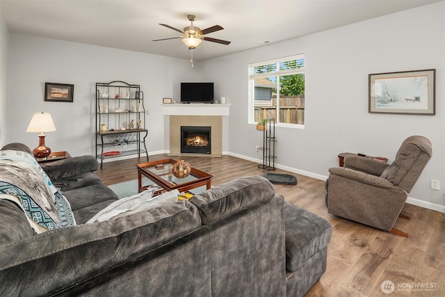 363 Franks Ln N, Enumclaw, WA 98022 - living room with a ceiling fan, a tile fireplace, and wood finished floors