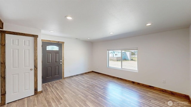 40 Utke Ln, Omak, WA 98841 - entryway with baseboards, light wood-style flooring, and recessed lighting