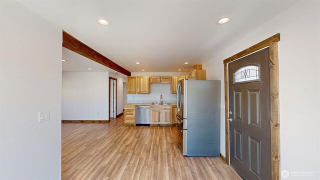 40 Utke Ln, Omak, WA 98841 - kitchen featuring appliances with stainless steel finishes, light brown cabinets, light countertops, light wood-style flooring, and recessed lighting