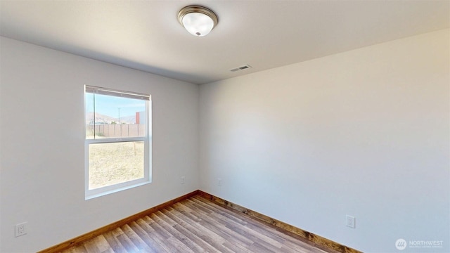 40 Utke Ln, Omak, WA 98841 - empty room with baseboards and light wood finished floors