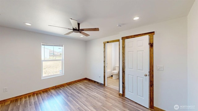 40 Utke Ln, Omak, WA 98841 - unfurnished bedroom featuring baseboards, light wood-style floors, recessed lighting, ensuite bath, and a ceiling fan