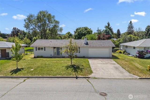 13524 E 5th Ave, Spokane Valley, WA 99216 - single story home with driveway, a garage, and a front yard