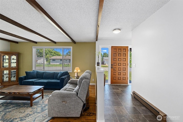 13524 E 5th Ave, Spokane Valley, WA 99216 - living room featuring a baseboard heating unit, a textured ceiling, beamed ceiling, and baseboards