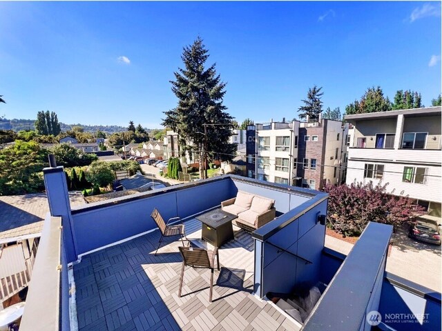 1042 S Donovan St Unit 5, Seattle, WA 98108 - view of patio with a fire pit
