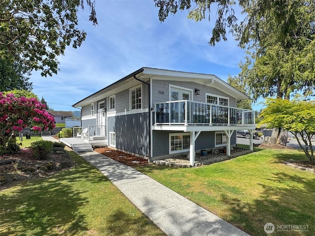 1538 W 12th St, Port Angeles, WA 98363 - view of front of property featuring a wooden deck and a front yard