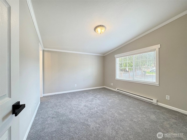 1538 W 12th St, Port Angeles, WA 98363 - carpeted empty room with baseboard heating, crown molding, baseboards, and vaulted ceiling