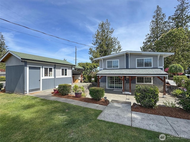 1538 W 12th St, Port Angeles, WA 98363 - view of front of house with a front lawn and an outbuilding