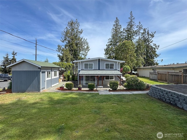 1538 W 12th St, Port Angeles, WA 98363 - back of house featuring a porch and an outdoor structure