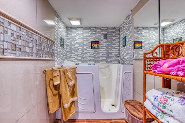 10008 Rainier Ave S, Seattle, WA 98178 - bathroom with tile walls and a tub to relax in