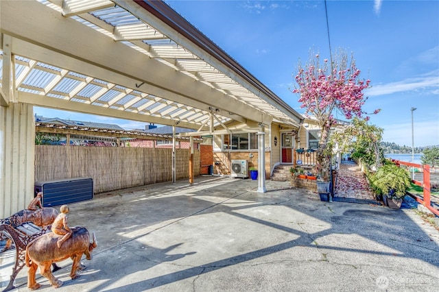 10008 Rainier Ave S, Seattle, WA 98178 - view of patio featuring a pergola and washer / clothes dryer