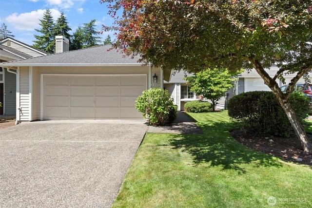 12731 102nd Ave NE, Kirkland, WA 98034 - view of front facade featuring concrete driveway, an attached garage, a front yard, a chimney, and roof with shingles