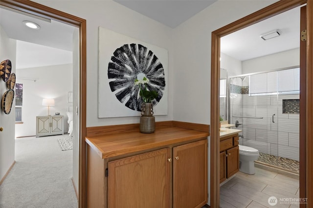 12731 102nd Ave NE, Kirkland, WA 98034 - full bathroom with a shower stall, vanity, and toilet