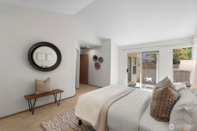 12731 102nd Ave NE, Kirkland, WA 98034 - bedroom with access to exterior, light carpet, lofted ceiling, and baseboards