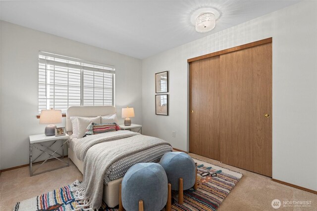 12731 102nd Ave NE, Kirkland, WA 98034 - carpeted bedroom featuring a closet and baseboards