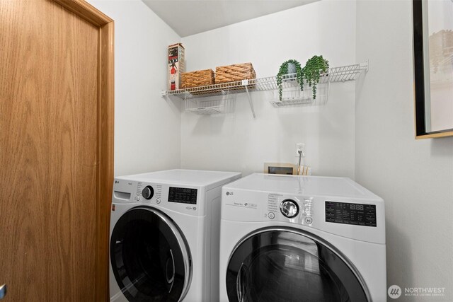 12731 102nd Ave NE, Kirkland, WA 98034 - laundry area with washer and clothes dryer