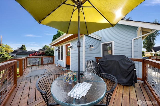 2218 Williams St, Bellingham, WA 98225 - wooden deck with outdoor dining space and grilling area