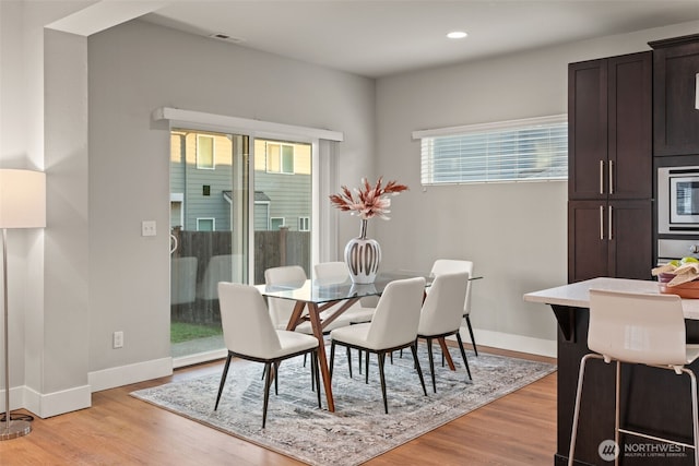 4408 214th Pl SE, Bothell, WA 98021 - dining space featuring light wood-style flooring, recessed lighting, and baseboards