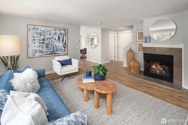 3046 128th Ave SE Unit 30, Bellevue, WA 98005 - living area with wood finished floors, a fireplace, baseboards, and recessed lighting