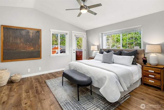 3046 128th Ave SE Unit 30, Bellevue, WA 98005 - bedroom featuring lofted ceiling, access to outside, wood finished floors, and multiple windows