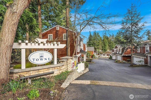 3046 128th Ave SE Unit 30, Bellevue, WA 98005 - community / neighborhood sign featuring driveway, an attached garage, and a residential view