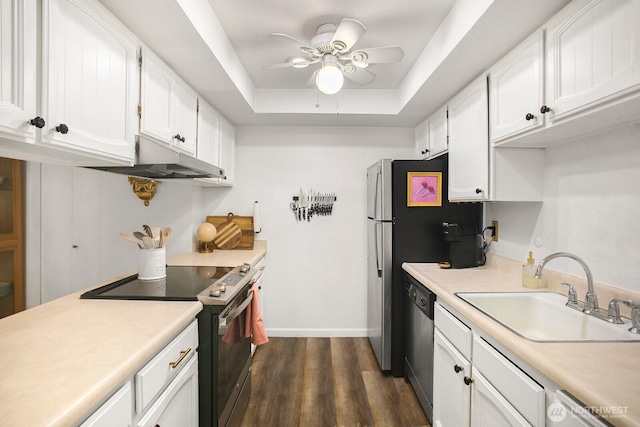 3505 W Government Way Unit 203, Seattle, WA 98199 - kitchen with a sink, range with electric stovetop, a ceiling fan, stainless steel dishwasher, and white cabinets