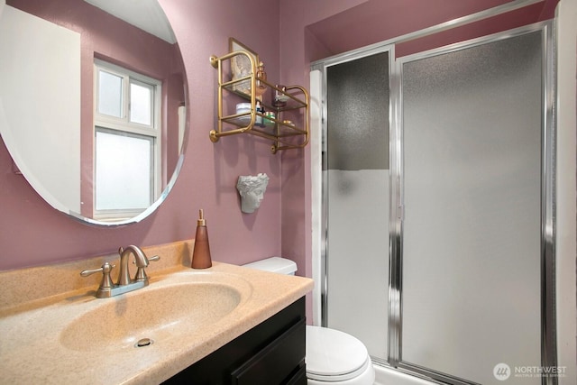 3505 W Government Way Unit 203, Seattle, WA 98199 - bathroom featuring toilet, a shower stall, and vanity