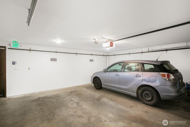 3505 W Government Way Unit 203, Seattle, WA 98199 - garage with a garage door opener