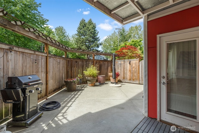 19500 Ballinger Way NE Unit 109, Shoreline, WA 98155 - fenced backyard featuring a patio area, a pergola, and grilling area