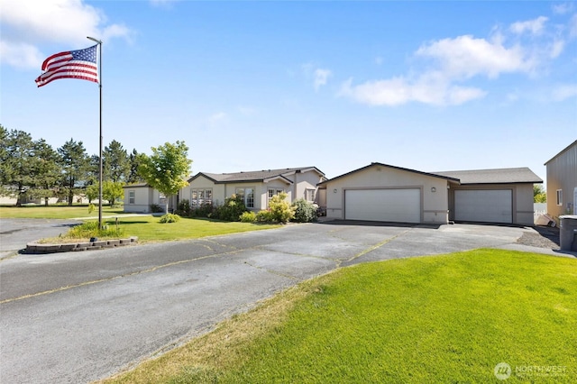1183 E.9 Rd NE, Moses Lake, WA 98837 - ranch-style home with a garage, a front lawn, a residential view, and asphalt driveway