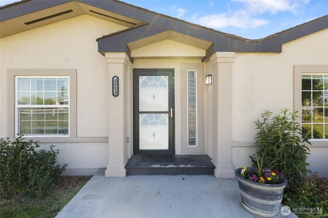 1183 E.9 Rd NE, Moses Lake, WA 98837 - doorway to property with stucco siding