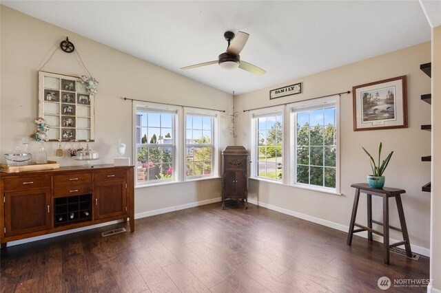 1183 E.9 Rd NE, Moses Lake, WA 98837 - sitting room with lofted ceiling, a ceiling fan, plenty of natural light, dark wood finished floors, and baseboards