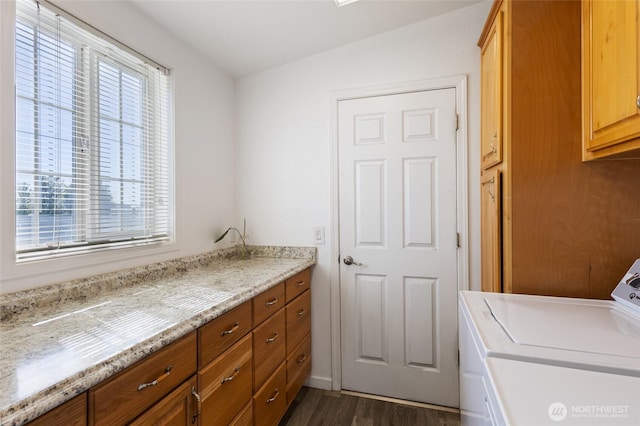 1183 E.9 Rd NE, Moses Lake, WA 98837 - laundry room with washing machine and dryer, cabinet space, and dark wood-type flooring