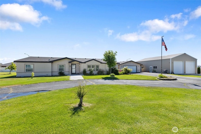 1183 E.9 Rd NE, Moses Lake, WA 98837 - single story home with a front yard and a detached garage