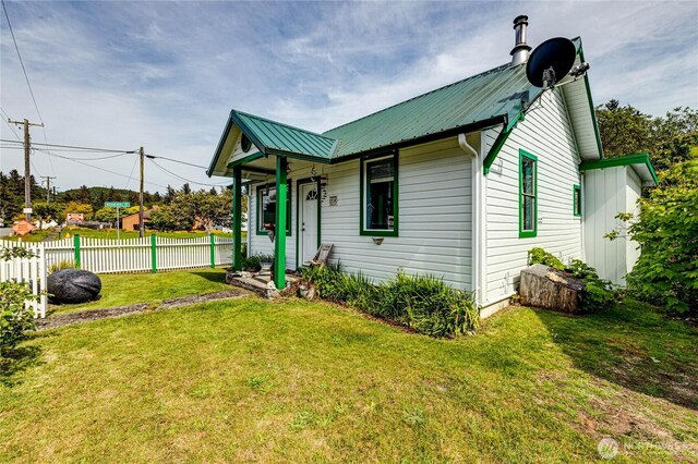 16672 Frontier St, Clallam Bay, WA 98326 - view of front facade featuring metal roof