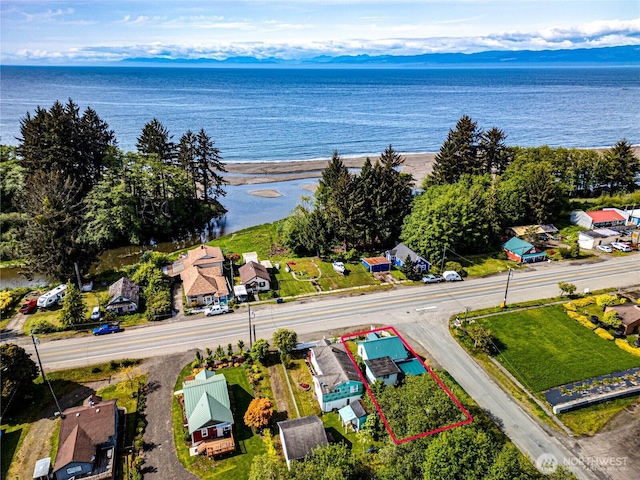16672 Frontier St, Clallam Bay, WA 98326 - aerial view of residential area with property boundaries highlighted and a large body of water
