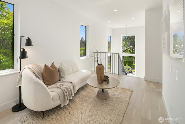 5822 56th Ave NE, Seattle, WA 98105 - living area featuring light wood-style floors and recessed lighting