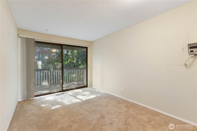 24727 12th Ave S, Des Moines, WA 98198 - carpeted spare room with a textured ceiling and baseboards