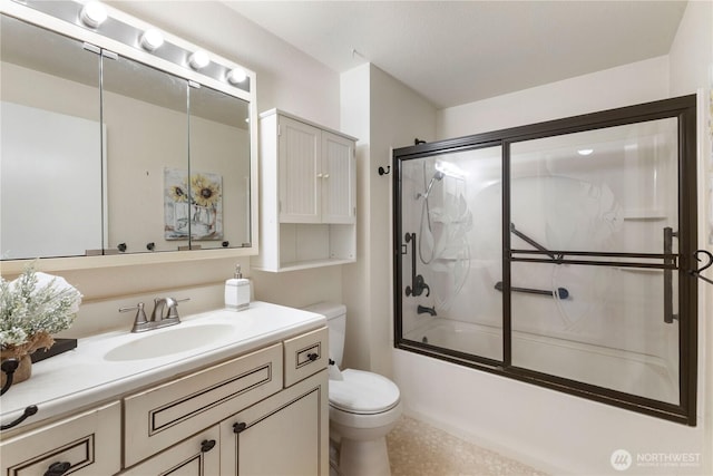 24727 12th Ave S, Des Moines, WA 98198 - full bathroom featuring toilet, vanity, and combined bath / shower with glass door