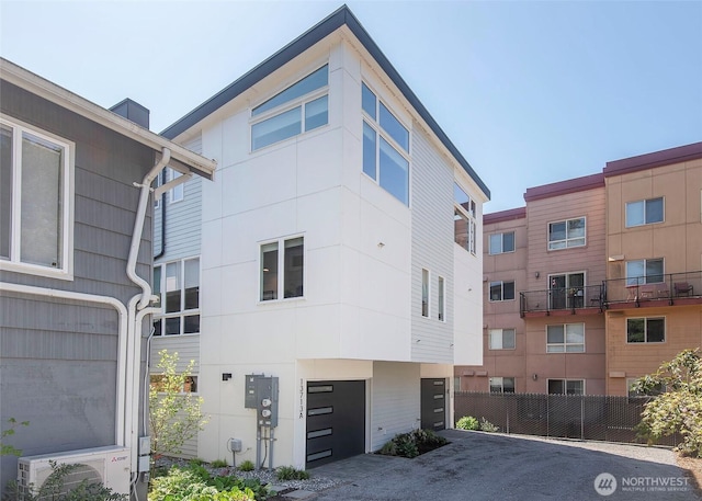 13713 35th Ave NE Unit A, Seattle, WA 98125 - view of building exterior with a cooling unit