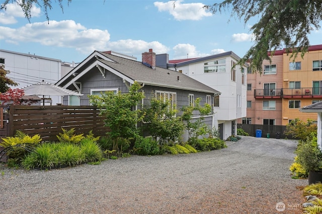 13713 35th Ave NE Unit A, Seattle, WA 98125 - exterior space featuring driveway and an attached garage