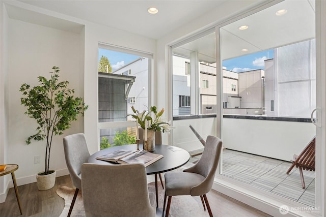 13713 35th Ave NE Unit A, Seattle, WA 98125 - dining space featuring light wood finished floors and recessed lighting