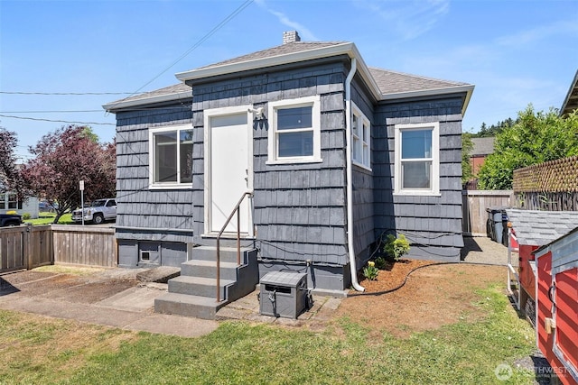 121 SW Alfred Ave, Chehalis, WA 98532 - rear view of property with entry steps and roof with shingles