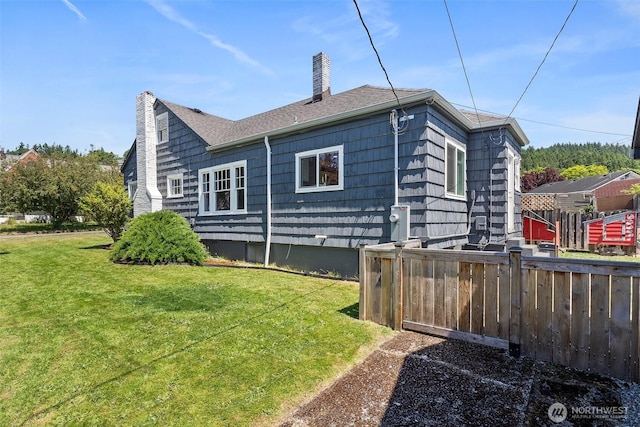 121 SW Alfred Ave, Chehalis, WA 98532 - view of property exterior with a chimney